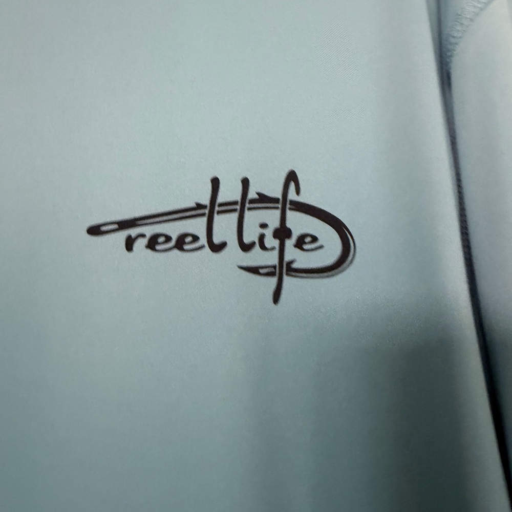 Reel Life Men’s Performance Long Sleeve Tee in Light Blue